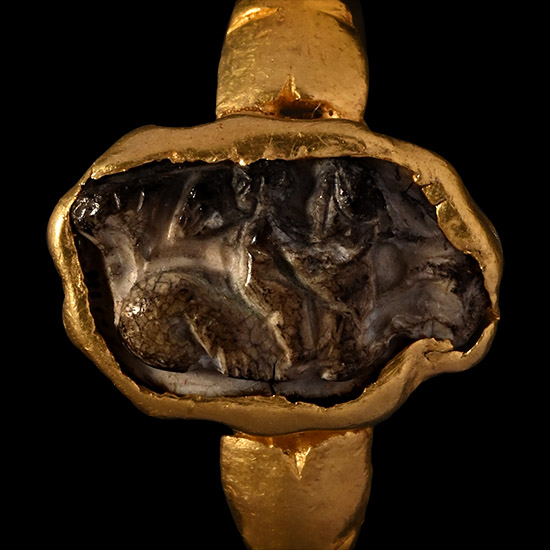Roman Gold Ring with Burnt Agate Cameo of Eros, the Greek God of Love Riding a Hippocampus