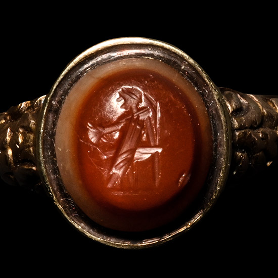 Roman Carnelian Onyx Gemstone of a Seated Muse Set into a Gold Georgian Ring
