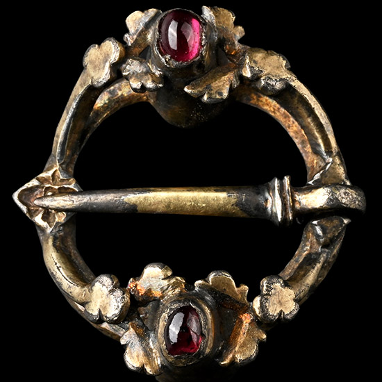 Medieval Silver-Gilt Ring Brooch with Garnet Cabochons