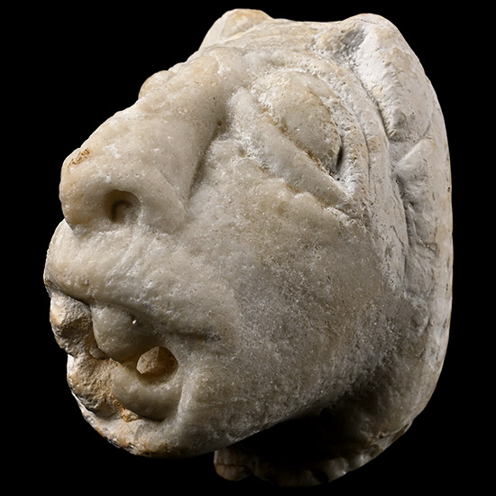 Medieval Marble Head of a Demonic Lion
