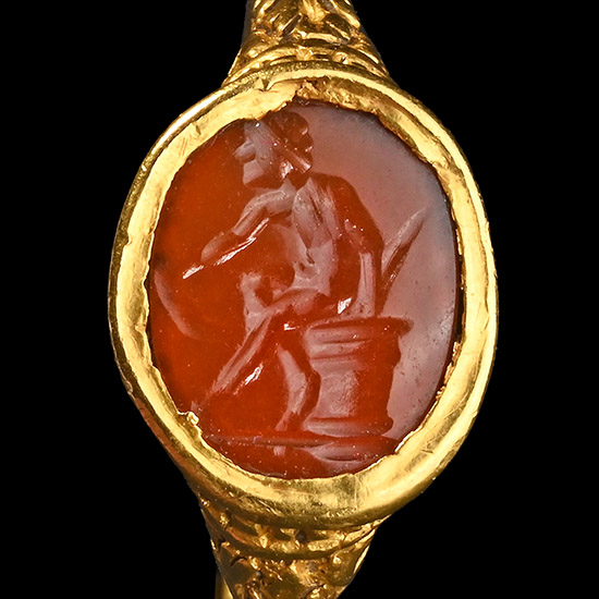 Renaissance Gold Ring with Carnelian Gemstone of a Resting Hero