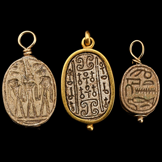 Collection of Egyptian Faience and Steatite Scarabs with Gold Mounts