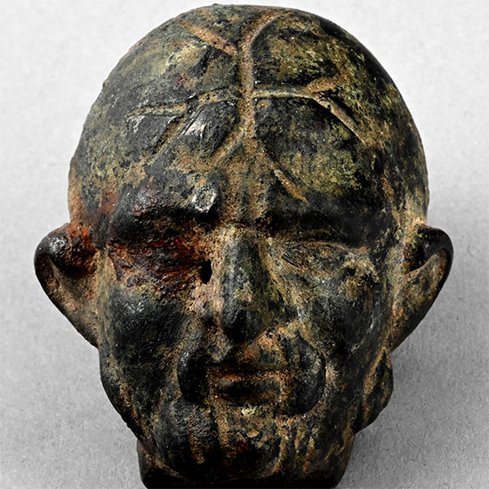 Roman Bronze Head with Cross Fourchee