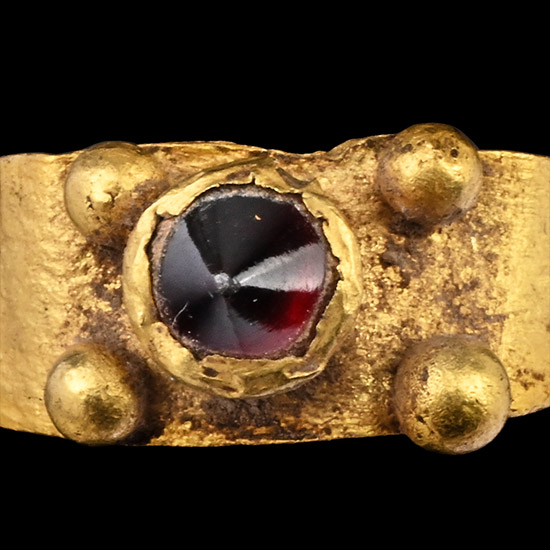 Roman Gold Ring with Conical Ruby-Coloured Gem