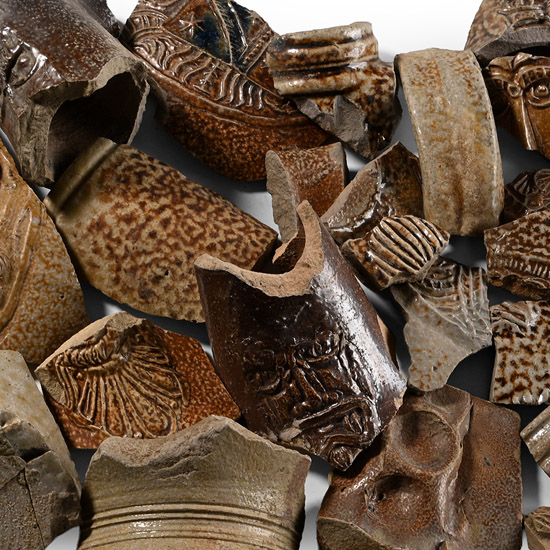 Glazed Bellarmine Pottery Fragment Collection Including Faces