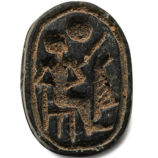 Egyptian Black Stone Scarab with Seated Figure