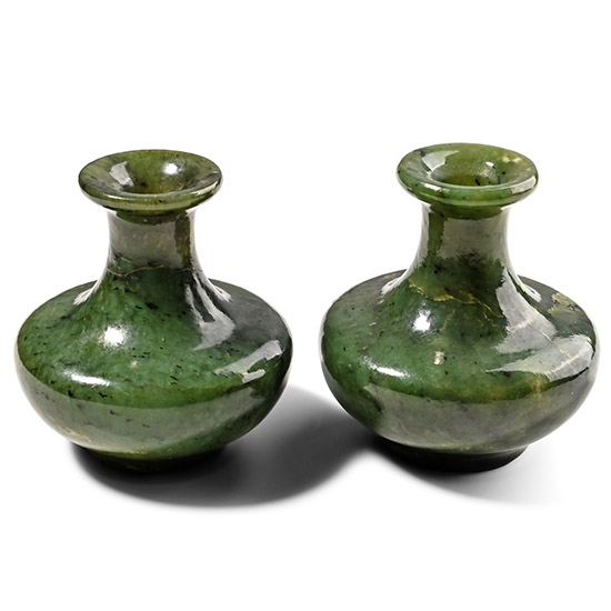 Carved and Polished Green Stone Vase Pair