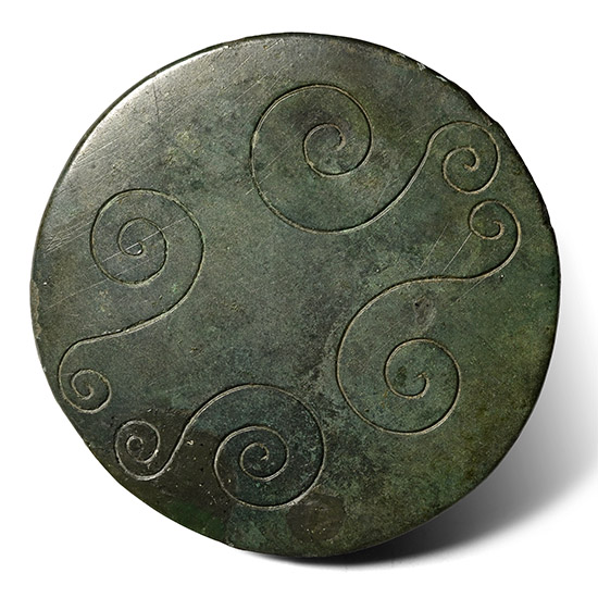 Scythian Bronze Roundel with Sea Scroll Pairs