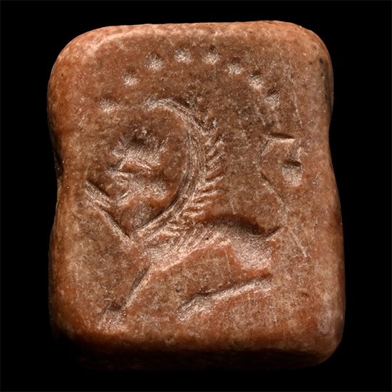 Western Asiatic Bifacial Jasper Amuletic Bead with Human-Head Winged Lion