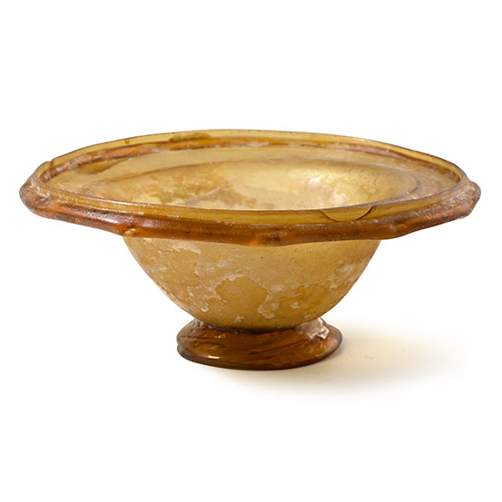 Roman Amber-Coloured Glass Footed Bowl with decorated Applied Rim