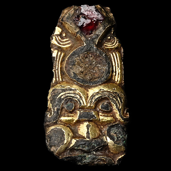 Anglo-Saxon Gilt Bronze Head Mount with Inlaid Garnet