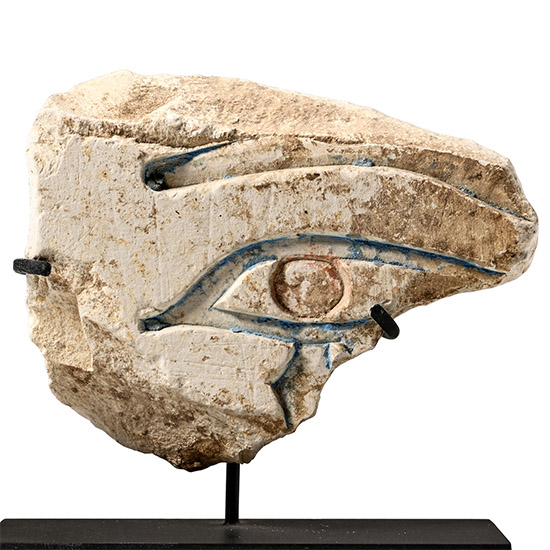 Egyptian Painted Limestone Fragment of a Wedjat Eye