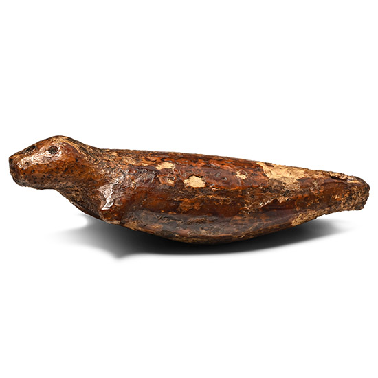 Native North American Inuit Carved Fossilized Walrus Bone Toggle in the Form of a Seal