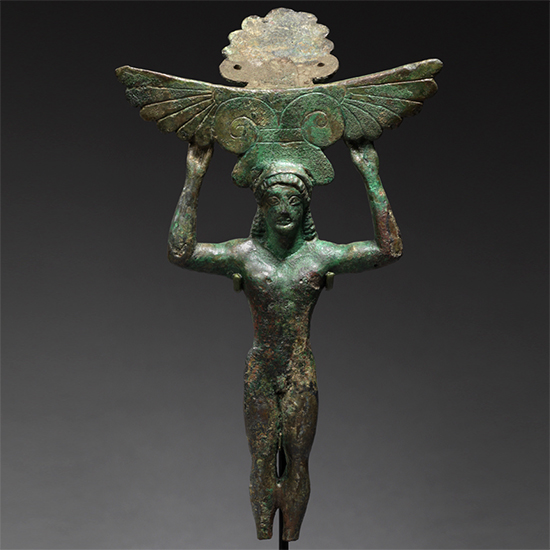 Greek Bronze Patera Handle in the form of a Naked Youth