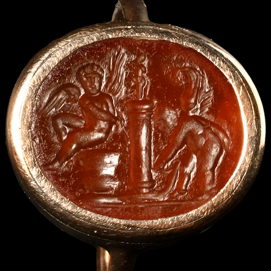 Roman Carnelian Gemstone of Two Erotes Flanking a Column in a Nineteenth-Century Gold Ring