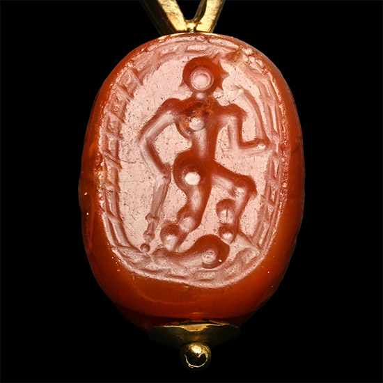 Greek Carnelian Scarab Engraved with Hercules with Later Gold Setting