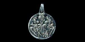 Viking Silver-Gilt Pendant with Odin Gripping Two Ravens