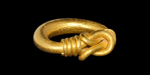 Gold Twisted Wire Ring on Solid Band
