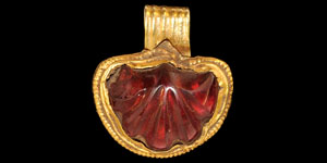 Gold and Garnet Scallop Pendant