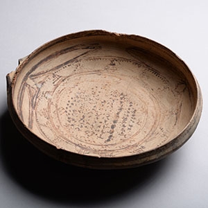 Decorated Bowl with Stamped Characters to Reverse