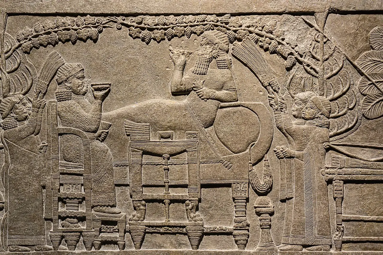 The Garden Party relief of Ashurbanipal: the king reclines while his queen sits upright