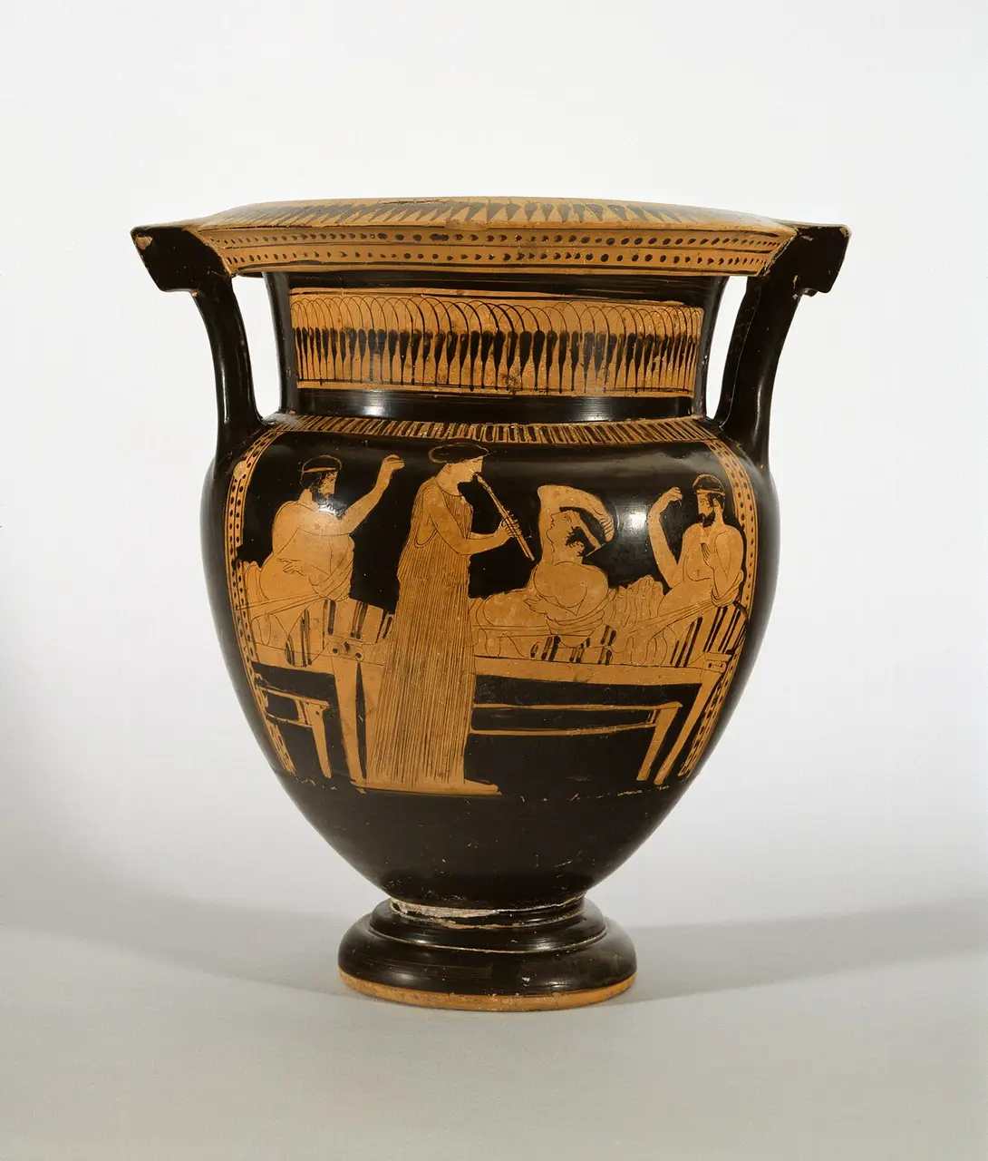 A symposion on an Attic red-figure column-krater attributed to the Naples Painter
