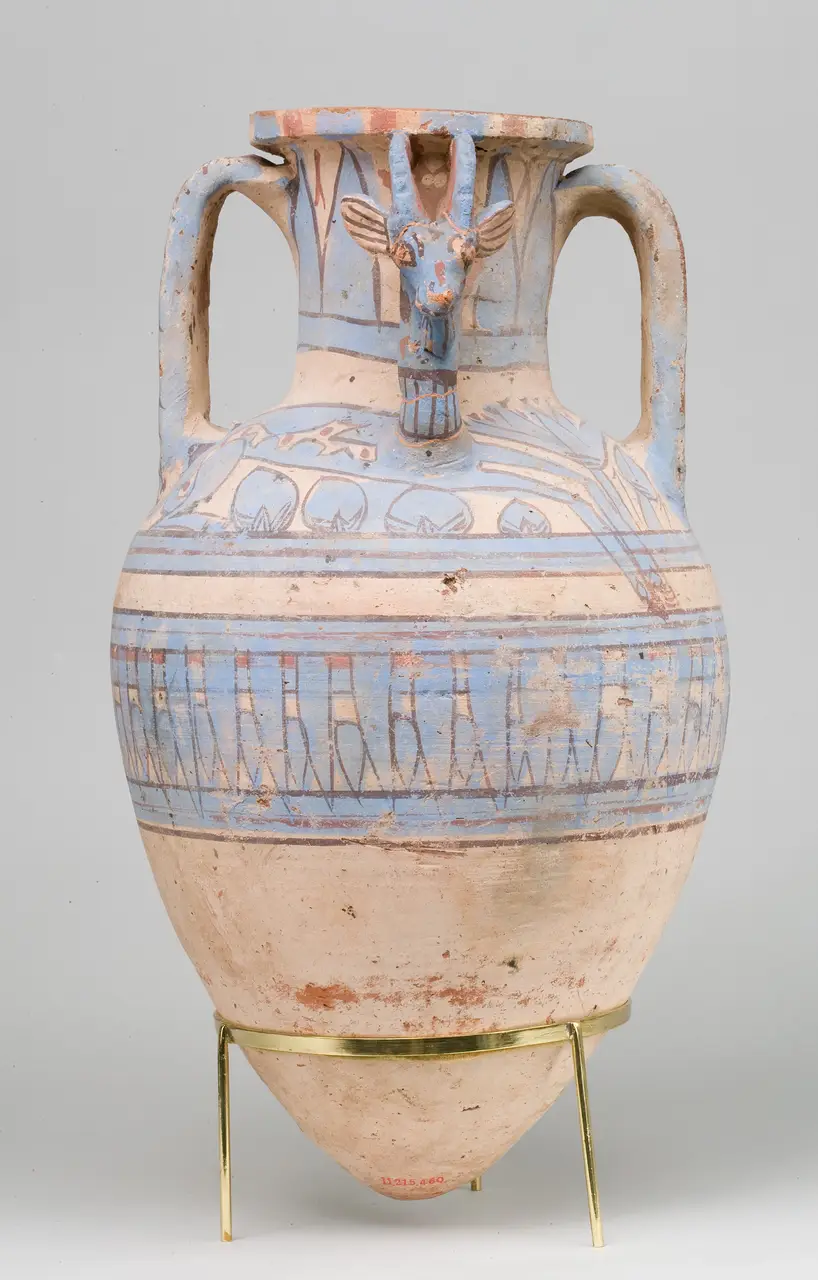 A blue-painted amphora from Malqata with a modelled ibex head
