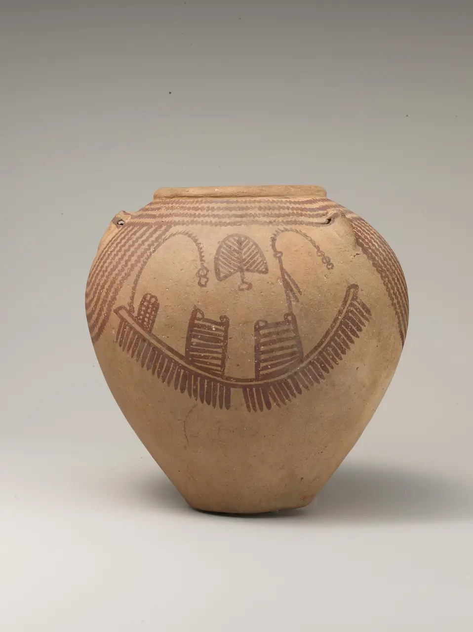 A Naqada II Decorated ware jar painted with a many-oared boat