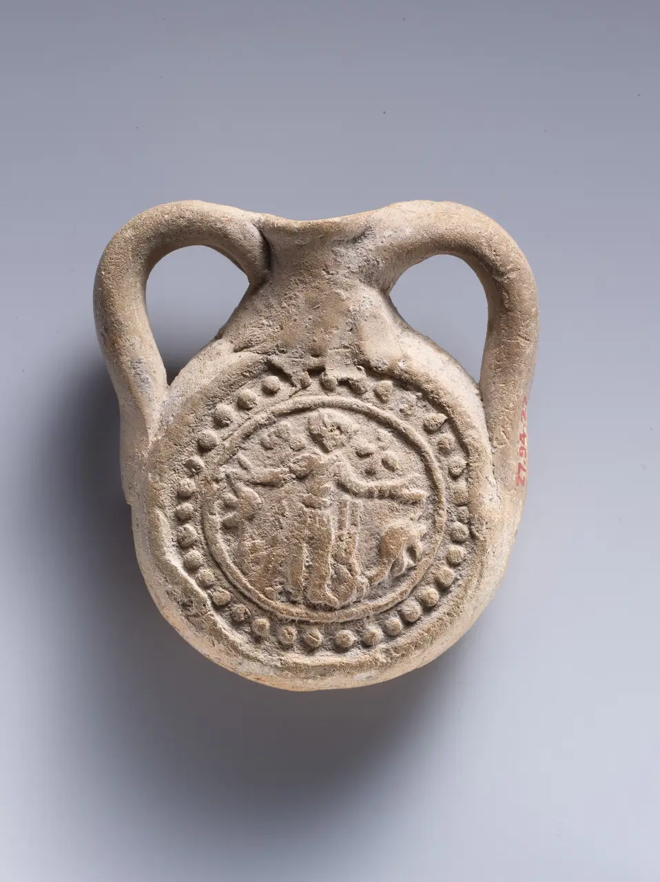 A St Menas ampulla showing the saint between two kneeling camels
