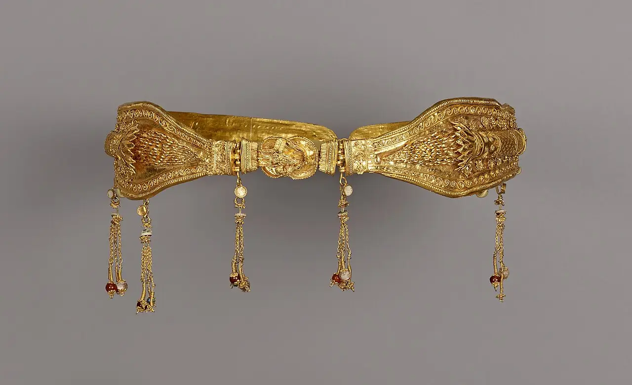 A Hellenistic gold diadem with a central Herakles knot and tasselled chains hanging from the band