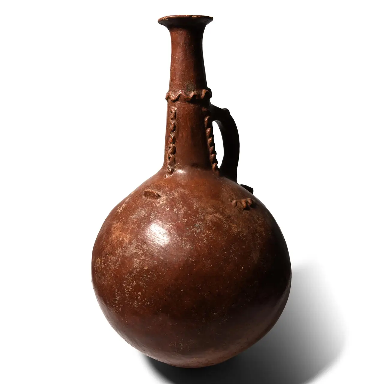 A very large Cypriot Red-Polished ware flagon with an applied serpent collar
