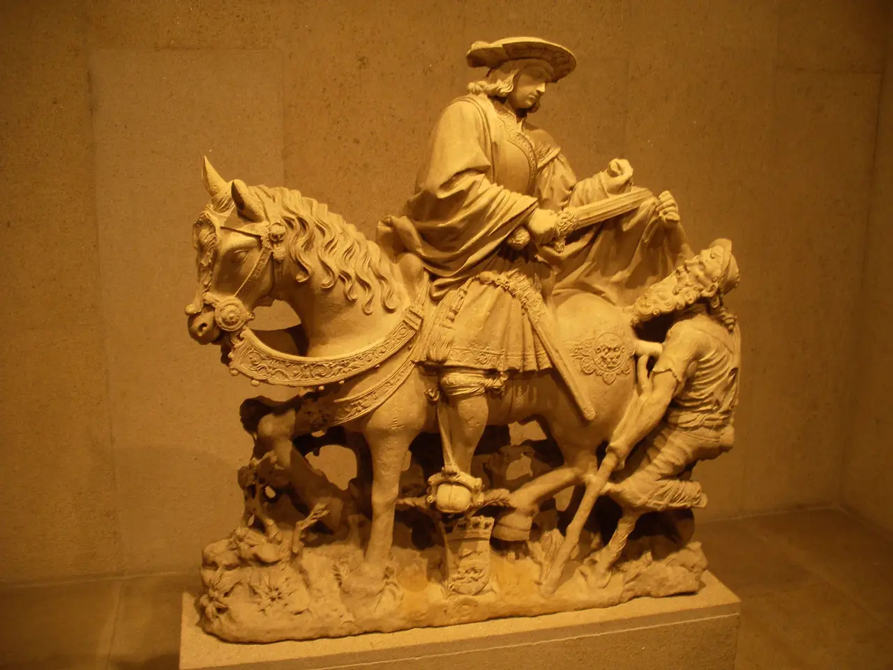 Limestone sculpture of St Martin on horseback dividing his cloak, in the Calouste Gulbenkian Museum