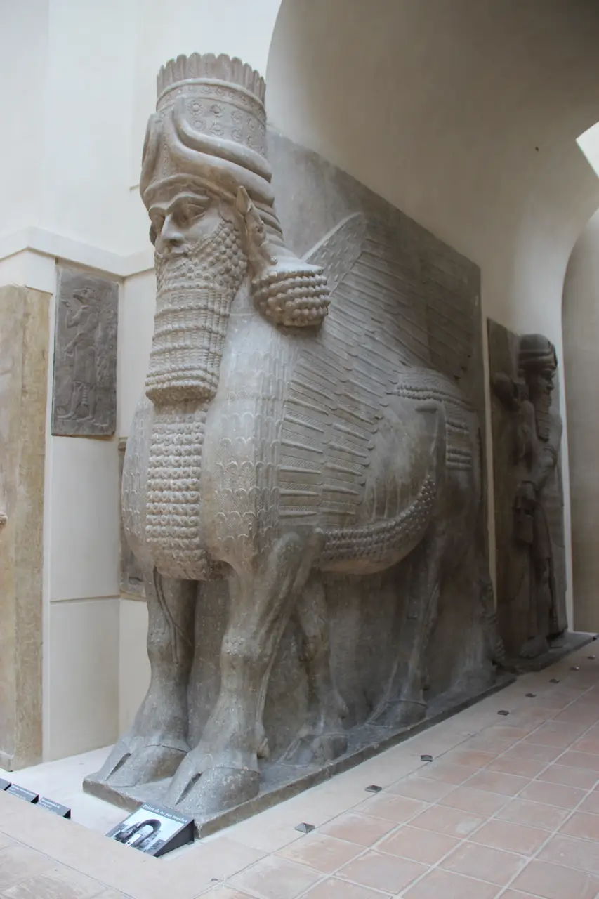 Neo-Assyrian winged human-headed bull colossus, the lamassu proper, from a palace gate