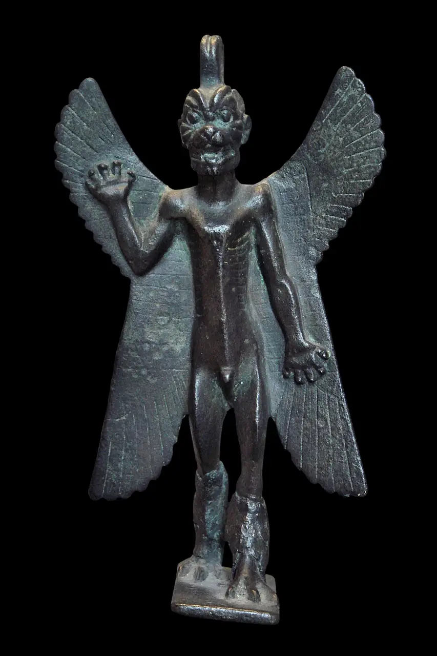 Complete bronze statuette of Pazuzu, winged, with talons and a scorpion tail