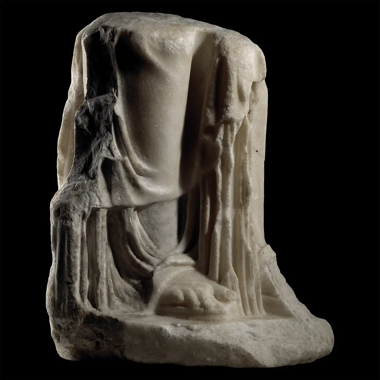 Lower Half of a Roman Marble Figure of the Goddess Isis