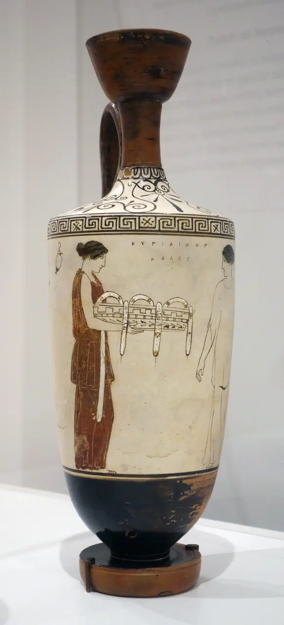 White-ground lekythos attributed to the Achilles Painter, a woman in surviving red drapery beside a figure reduced to bare outline