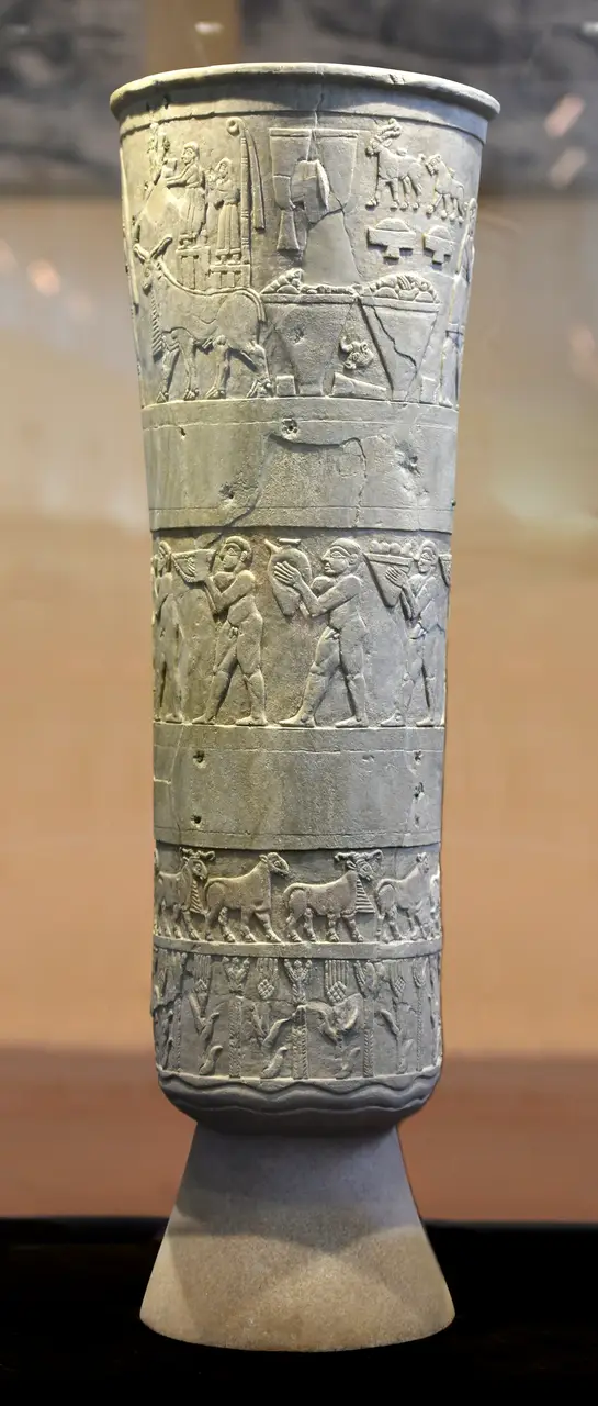 The Warka Vase, a carved alabaster vessel with registers of offering-bearers, in the Iraq Museum