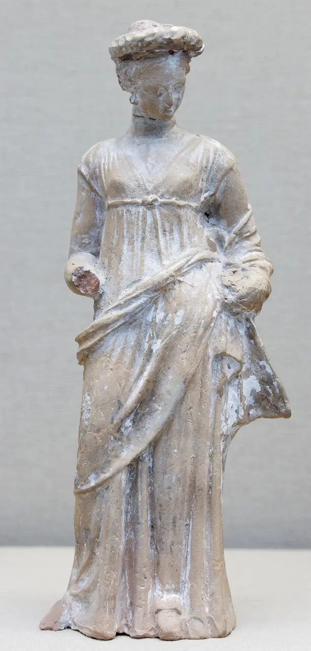 A Hellenistic Greek terracotta figurine of a draped woman