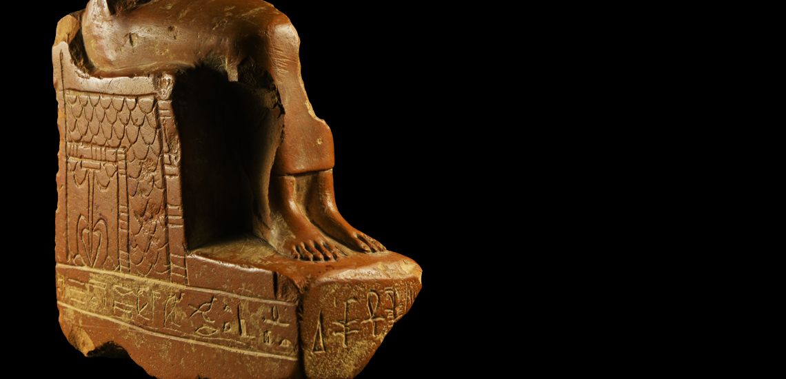 Egyptian Seated Figure with Hieroglyphs