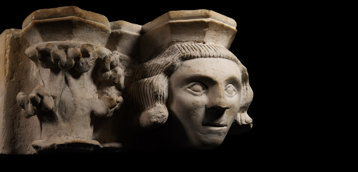 Medieval Capital and Corbel Head from the Priory of Moutiers-Saint-Jean
