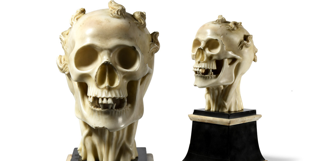 Carved Marble Skull with Locks of Hair