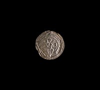 Medieval Silver Bracteate with Seated Figure