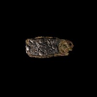Anglo-Saxon Bronze Strap End with Rivetted Silver Plate with Beast Facing Back