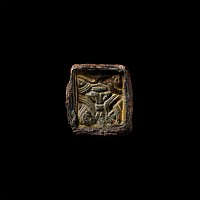 Anglo-Saxon Gilt Chip-Carved Shield Mount with Beast Mask