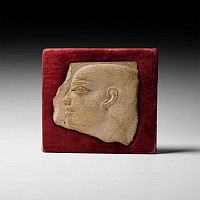 Egyptian Limestone Fragment with Face