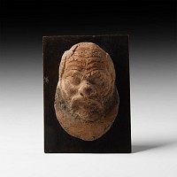 Greek Terracotta Mask of a Satyr