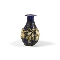 Roman Blue Glass Vessel with Vine Leaf Design