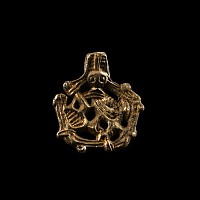 Viking Age Silver-Gilt Gripping Beast Pendant