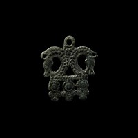 Viking Age Bronze Pendant with Opposed Horse Heads