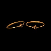 Western Asiatic Gold Hinged Bracelet with Garnet